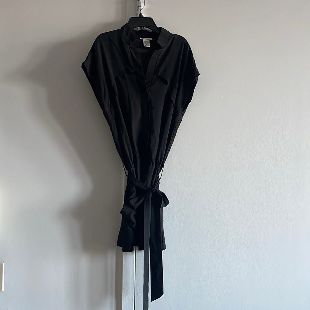 Mini black dress belted stretch waist, front pockets, placket details
